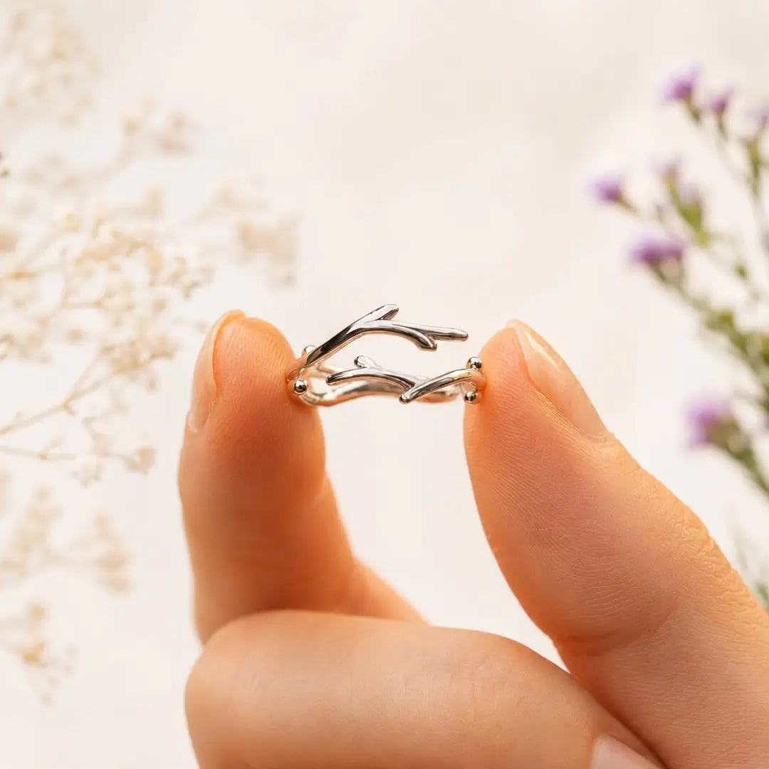 Close-up of Vesper ring worn on finger
